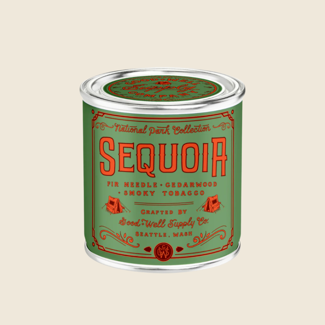 Green and red candle can labeled 'Sequoia' 